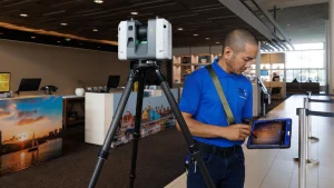 As-Built surveyor using the Leica RTC 360 LiDAR laser scanner to gather point cloud data.